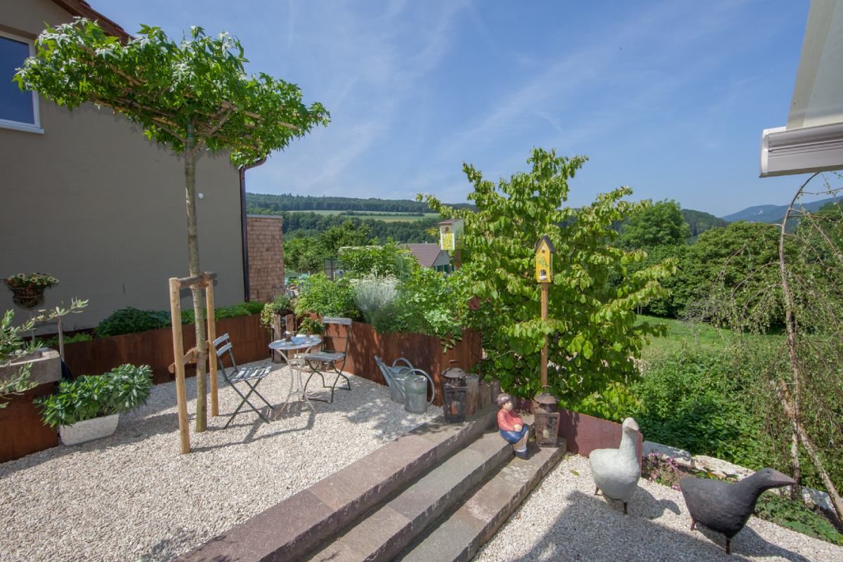 HS Gartenbau GmbH Terrasse mit Treppe