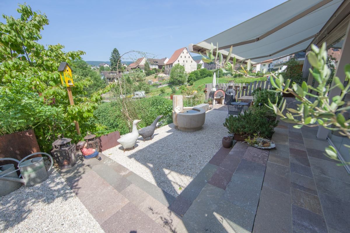 HS Gartenbau GmbH Terrasse mit Pflanzen